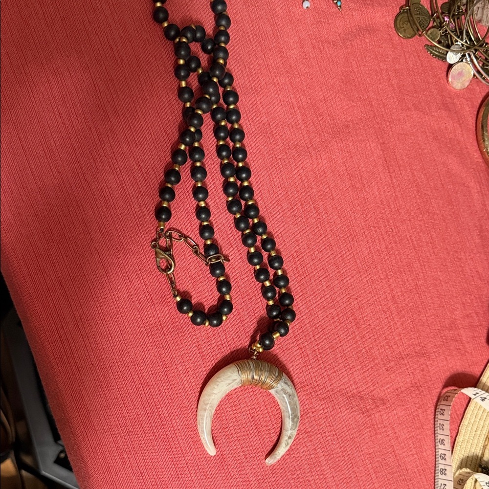 Black and Gold beaded long necklace with crescent pendant